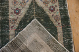 Detail of vintage distressed Oushak rug revealing mostly even wear to knot heads and foundation.