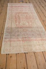 Textured distressed Oushak rug runner pile with abrash and faded ivory, blush tones.