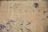 Vintage Distressed Oushak rug texture with low pile, visible knot heads, and beige, blue, green.