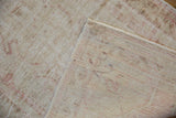 Vintage distressed Oushak rug pile and hand-knotted foundation, with prominent wear.