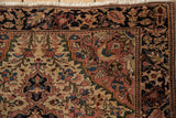 Vintage Farahan Sarouk rug corner, floral motifs in navy, blush, beige, intact selvage, white fringe.