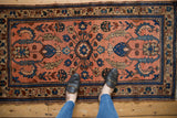 Vintage Mehreban rug with dusty blush field, samovar turtle motifs, and finned blossoms in sapphire and copper.