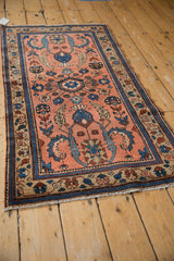 Vintage Mehreban rug with partial Samovar Turtle design, blush, blue, and beige floral border.