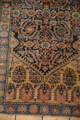 Detail of vintage Farahan Sarouk rug: saffron field, intricate Herati and shrub design.