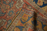 Antique Halvai Bijar with rare saffron yellow border, cobalt blue vine, madder red field, and patina.