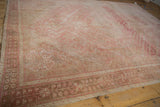 Distressed vintage Shiraz border with interconnected blossom motif, showing wear to blush and beige.
