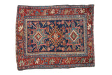 Vintage Karaja rug: navy blue field, triple geometric medallion, and cherry red border.