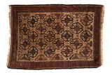 Vintage Belouch rug with a hook-and-latch gul design in beige, sapphire blue, and aubergine.