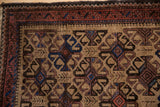 Pawn motif border and hook-and-latch guls in aubergine, blue, and beige on a vintage Belouch rug.