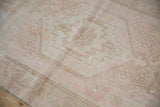 Vintage Distressed Oushak rug showing soft dusty rose and ivory patina patterns.