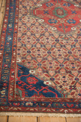 Sapphire blue corner spandrel and paneled lattice of a vintage Hamadan runner.