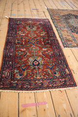 Vintage Lilihan runner's fine wool, cherry red field, oversized palmettes, and blue arabesques.