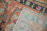 The hand-knotted reverse and side finish of a vintage distressed Turkish Oushak rug.