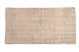 Distressed vintage Oushak rug runner, soft cream and pale brown tones with a faded medallion, 2'7