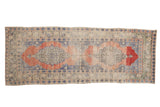 Distressed vintage Oushak rug runner with faded dusty rose and blue scalloped medallions, 3'1
