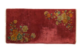 Hand-knotted Chinese Nichols Art Deco runner, cochineal red field and diagonal floral bouquets.
