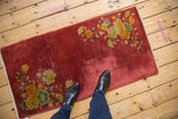 Vintage Art Deco runner with diagonal floral blossoms on dusty raspberry red.