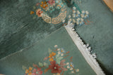 Art Deco rug corner: sage green pile texture, plain woven kilim, and tattered fringe.