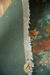 Sage green kilim backing, tattered edge, and Nichols factory stamp remnant.