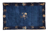 Vintage hand-knotted Peking rug with central floral motif and navy blue field, 3'1