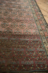 Intricate shadow boteh motifs and pronounced color abrash on an antique Hamadan runner.