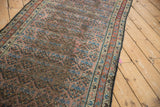 Antique Kurdish Hamadan runner: aubergine ground, blue shadow boteh, madder red border, wear.