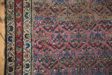 Traditional patterned border of antique Kurdish Hamadan runner, abrash aubergine field, boteh motifs.