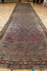 Antique Hamadan runner end: shadow boteh on aubergine, traditional red and blue borders.