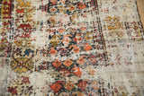 Vintage Caucasian runner with visible foundation, worn cream, red, and orange boteh patterns.