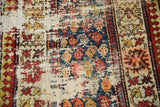 Playful striated botehs and exposed foundation of a vintage Caucasian runner.