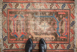 Unusual dragon arabesque and palmette design on vintage Hamadan rug, foundation showing.