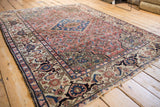 Vintage Malayer rug border, faded brick red Herati, sapphire blue palmette motifs, tattered edge.