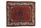 Vintage Persian Engelas rug with a diamond medallion, rust-red boteh field, and ivory floral border.