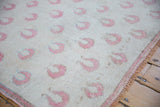 Evenly worn hand-knotted pile of a distressed vintage Turkish Oushak rug.