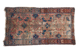 Antique Lilihan rug: dusty rose field, allover palmettes, blue serpent border, storied patina.
