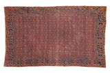 Antique Qashqai rug, unusual madder red panel lattice, charcoal navy border with love birds and wear.