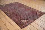 Vintage Farahan Sarouk rug with intricate Herati design, turtle samovar border, and central patch.