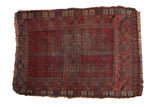Vintage Ersari rug, black cherry red with four-panel plant motif, worn pile, 3'6