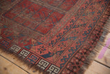 Ersari rug corner: red, teal ram's horn border, geometric motifs, hard wear, tatter.