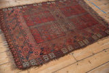 Vintage Ersari rug border with dusty teal ram's horn motifs and hard wear.