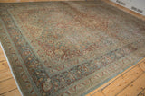 Vintage Distressed Kashan carpet corner, showing dusty blue, red floral borders and visible white knots.