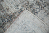Detail of the secure hand-knotted foundation and side cord on an antique Kerman carpet.