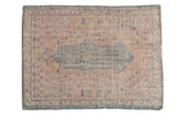 Distressed vintage Oushak rug with a faded pale rose field, asymmetric dusty ocean green medallion, 2'8