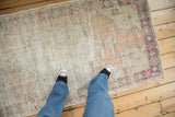 Distressed Oushak runner, soft ivory, beige, and dusty rose tones with subtle pattern.