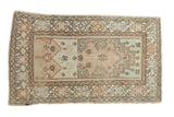 Vintage distressed Oushak rug with a prayer design, starburst florals, in beige, tangerine, and silver tones.