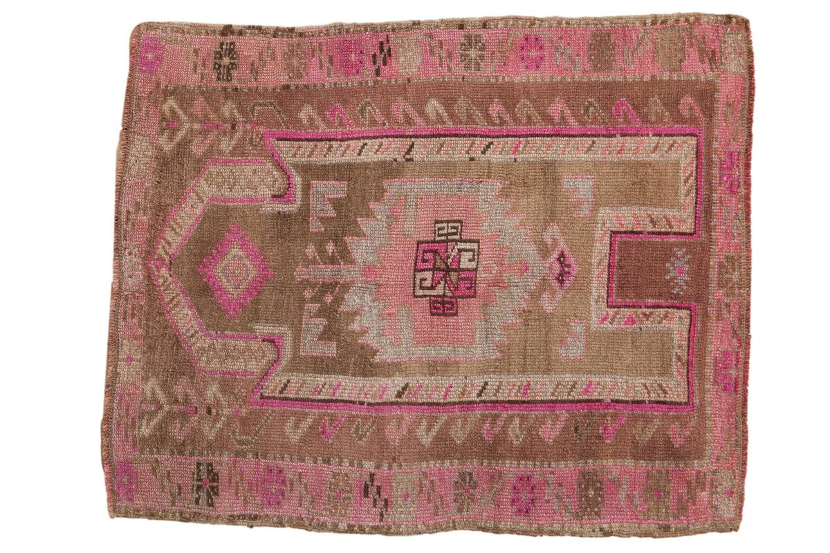 Distressed vintage Kars square rug featuring a pink, magenta, and brown prayer motif with serrated palmettes. 3'4" x 4'.