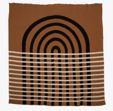 Stacey Garcia Arches modern knit blanket in brown, black, and beige geometric design.