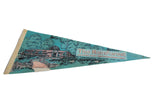 Vintage Rain Forest Zoo felt pennant at an angle, displaying the teal graphic and text.