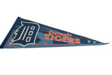 Angled side view of the vintage Detroit Tigers felt pennant in blue and orange.