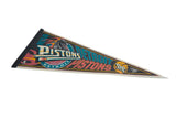 The vibrant horse mascot and logo design on a vintage Detroit Pistons felt pennant.